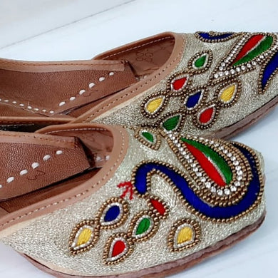 Light Gold Punjabi Juttis with Gold balls and Coloured Thread Designs