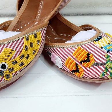Red and White Striped Punjabi Juttis with Coloured Balls Design