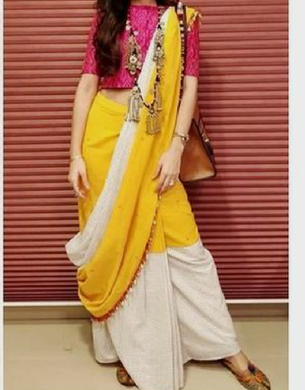 Yellow Mulmul Saree with White Designs